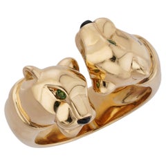 Bague CARTIER « Panthère » en onyx et grenat tsavorite, or jaune, taille 53