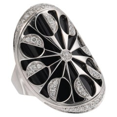Anello BULGARI in oro bianco con intarsio di diamanti e onice