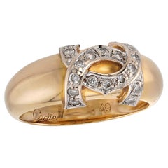 Bague CARTIER vintage en or jaune 18 carats avec logo « Double C » et diamants, taille 49
