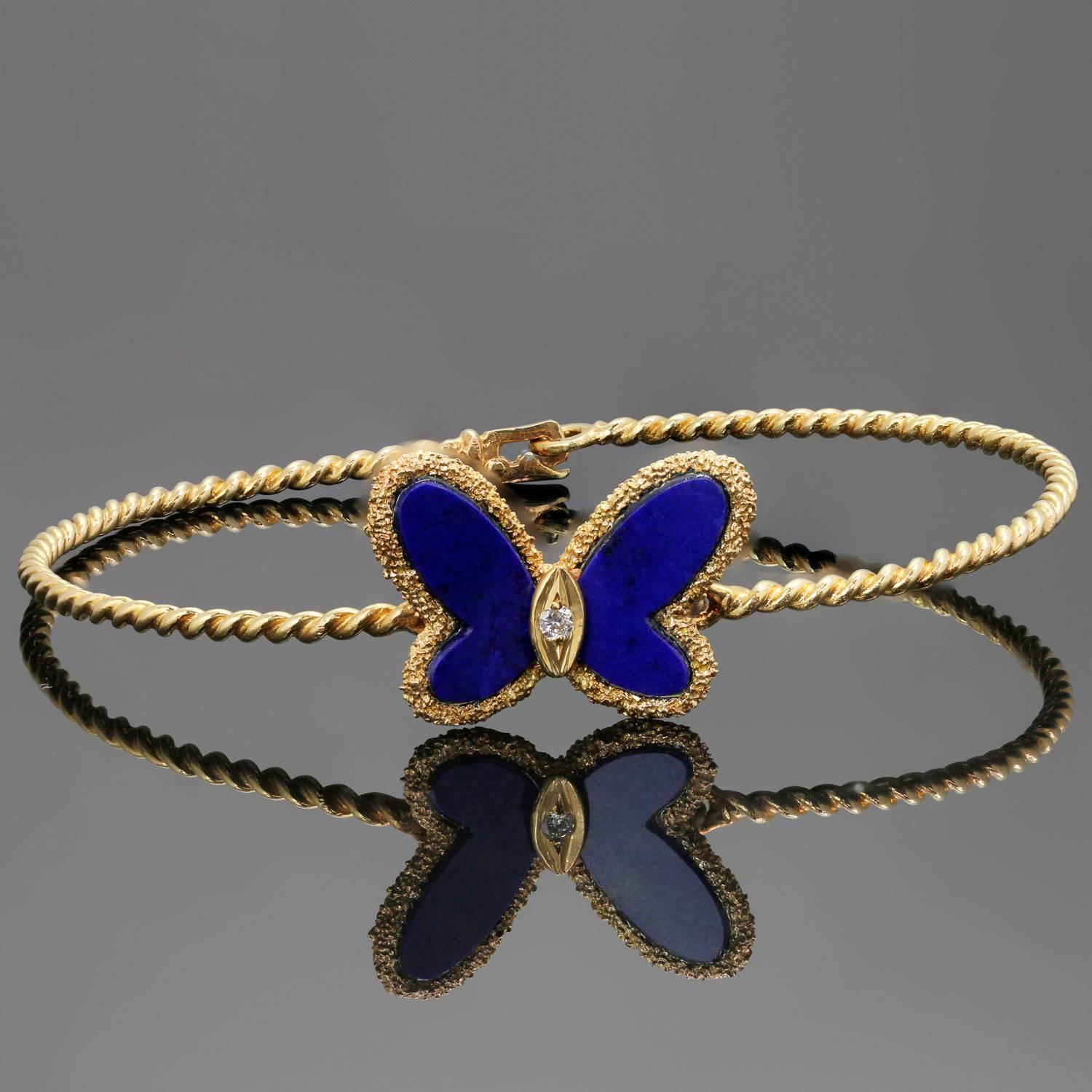 This stunning bracelet by Van Cleef & Arpels is crafted in 18k yellow gold and beautifully accented with a butterfly inlaid with blue Lapis Lazuli wings and a brialliant round-cut diamond. Measurements: 7" (17.7cm) length. 