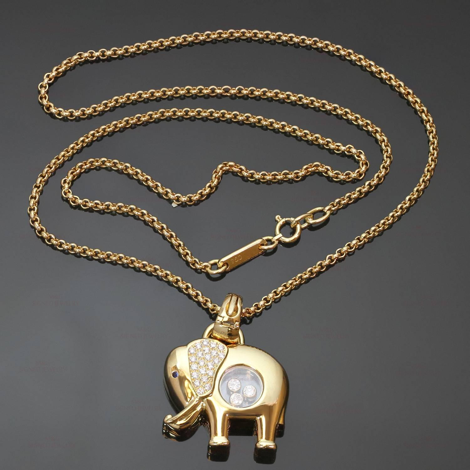 This chic Chopard necklace from the classic Happy Diamond collection features an elephant-shaped pendant enhancer crafted in 18k yellow gold and accented with a blue sapphire eye, a sparkling pave-set diamond ear, and a round glazed interior