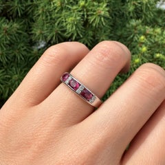 Platinum 1.06ctw East West Oval Channel Ruby and Diamond Band Ring