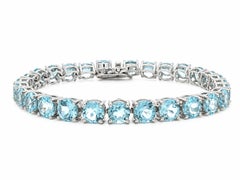 Sterling Silver 28ctw Light Blue Topaz Line Tennis Bracelet w/ Push Clasp