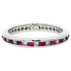 Platinum 0.68ctw Alternating Channel Pink Sapphire & Diamond Eternity Band Ring