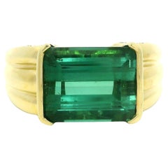 Anello con diamanti in oro giallo 18k GIA da 6,43 carati e mezzo castone con tormalina verde bluastra