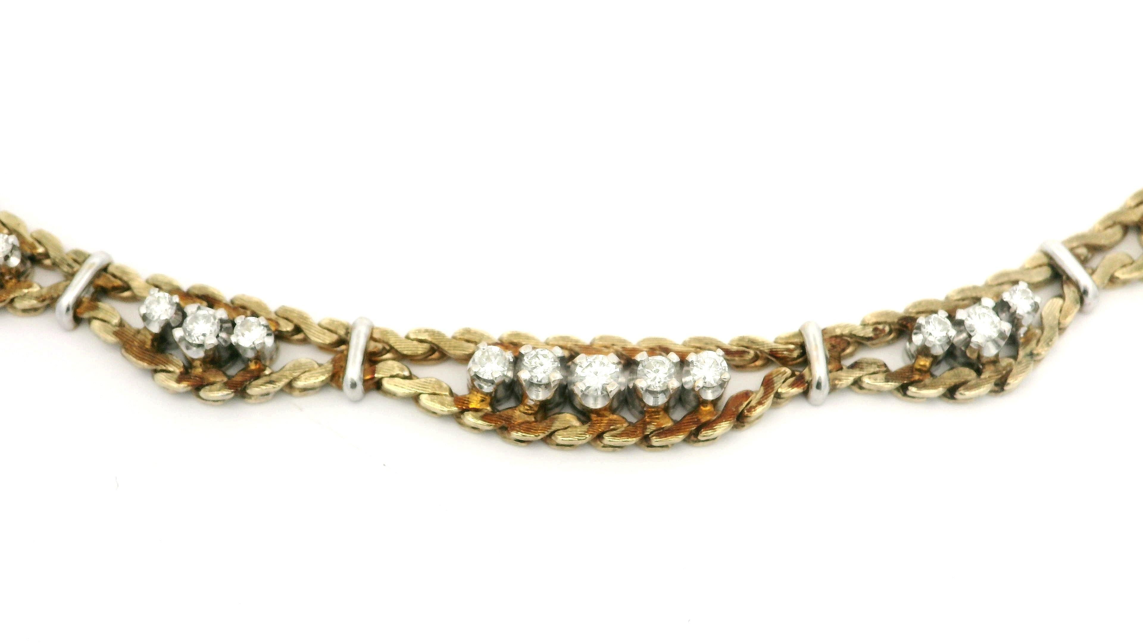 -Pierre(s)
(17) Diamant naturel véritable - taille ronde brillante - serti - couleur G/H - pureté VS2-SI2 - 0,45ctw (approx.)

MATERIAL : Or jaune 14k massif avec paniers et entretoises en or blanc
Poids : 25 grammes
Type de chaîne : 16