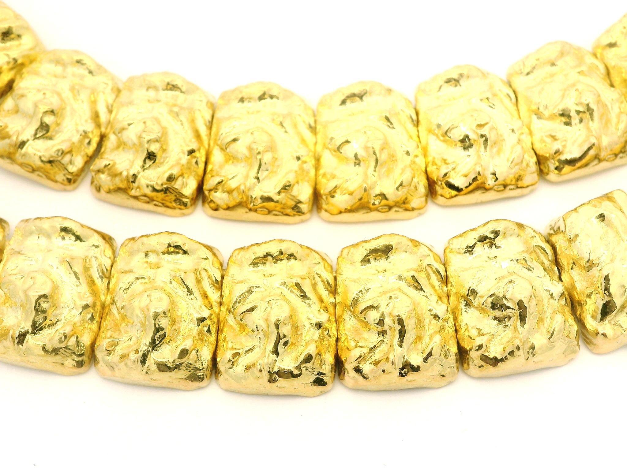 Material: Solid 18k Yellow Gold
Weight: 138.28 Grams
Chain Type: Nugget Graduated Link
Chain Length: 16 Inches
Chain Width: Graduated from 14.3mm (0.56