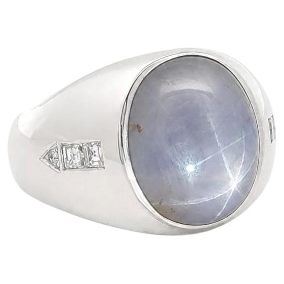 White Gold Oval Cabochon Star Sapphire w/ Diamond Arow Design Sides Bezel Ring For Sale