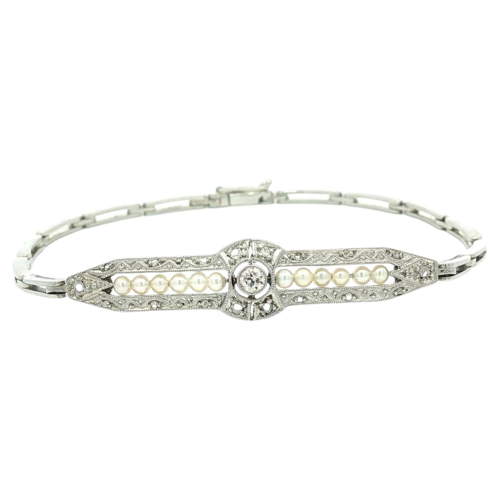 Bracelet antique de la Belle Époque en or blanc 18 carats, avec un maillon central orné d'un diamant et d'une perle de graine