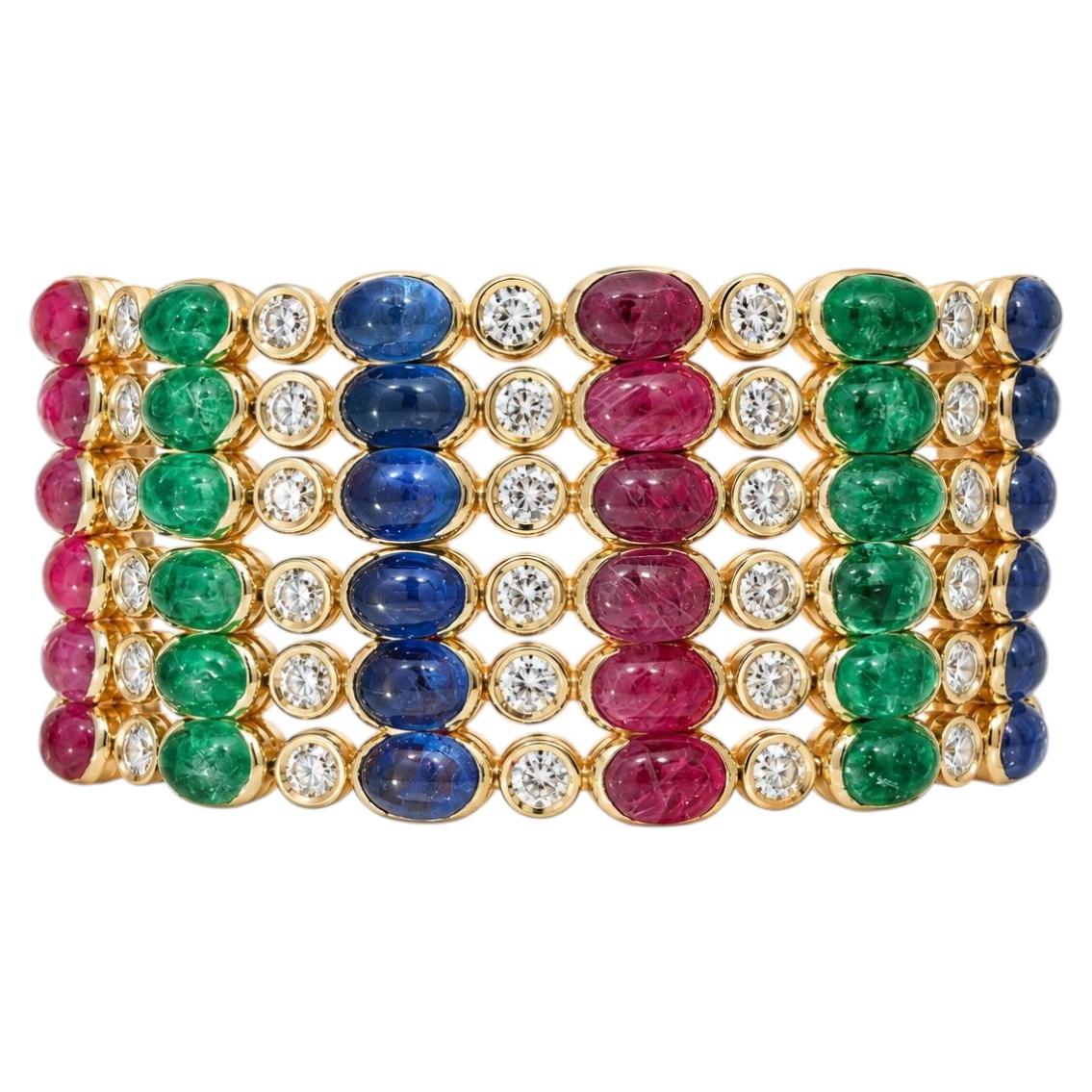 Bracciale vintage in oro massiccio a 6 fili, con zaffiri, rubini, smeraldi e diamanti per un totale di 88,40 carati in vendita