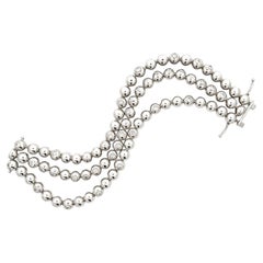 Bracelet Craig Drake en or blanc 18 carats, avec diamants sertis en lunette (2 carats au total) et 3 rangées de perles