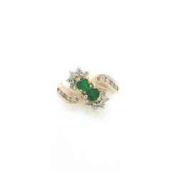 14k Yellow Gold 0.76ctw Round Emerald & Diamond Bypass Flower Cluster Ring