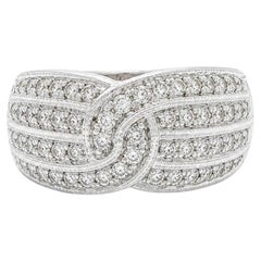 Anillo de oro blanco de 14k con diamantes de 0,45 ct en total, de 4 filas, con milgrain y un nudo grabado