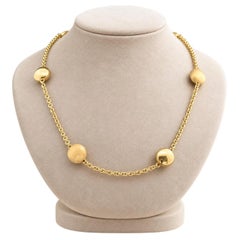 Collar de Chimento con cadena tipo cable y cuentas esféricas, en oro amarillo de 18k, pulido y cepillado