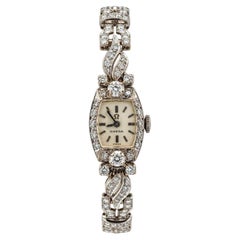 Antike Art-Déco-Uhr von Omega aus 14-karätigem Gold mit mechanischem Uhrwerk und einem Platinarmband mit Diamanten (6,2 Karat)