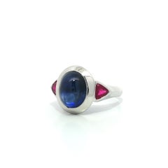 White Gold 6.34ctw GIA Bezel Oval Cabochon Sapphire w/ Trillion Ruby Sides Ring