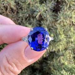 Platinum 6.5ctw GIA Oval Violetish Blue Tanzanite w/ Trillion Diamond Sides Ring