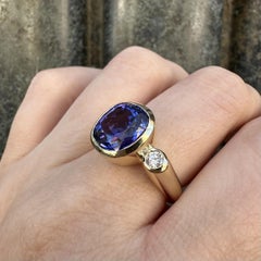 14k Yellow Gold 6.42ctw GIA Bezel Cushion Tanzanite w/ Round Diamond Sides