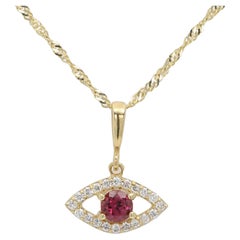 Mini œil maléfique en or jaune 14 carats avec rhodolite naturelle au centre