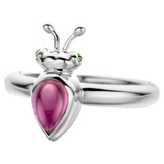 Anello moderno con granato di rodolite in oro bianco 18 carati