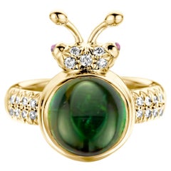 Moderner Ring aus 18 Karat Gelbgold mit grünem Turmalin und Diamant