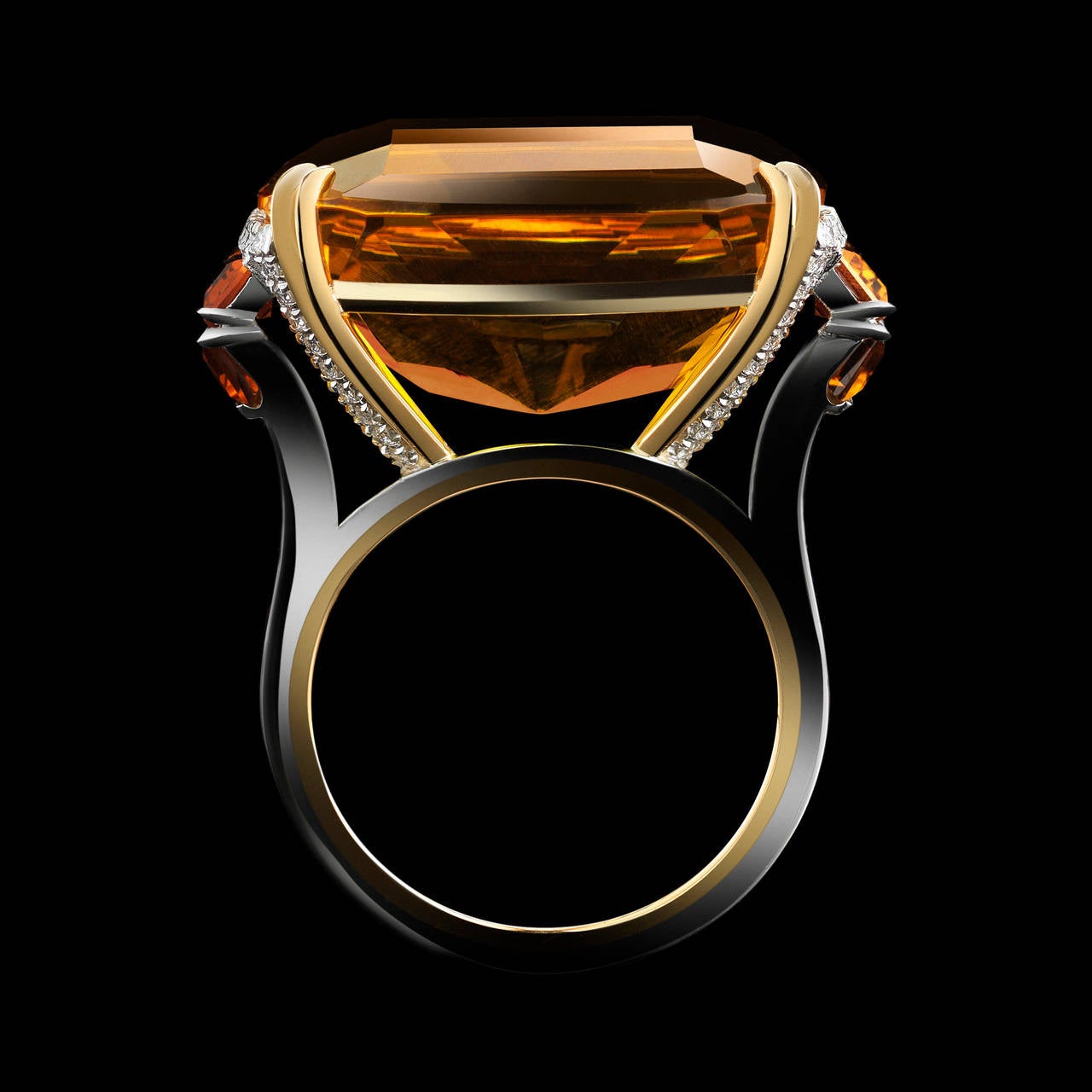 This ring features a 20.37 carat Cushion-cut deep-yellow citrine flanked by a pair of Trapezoid-shaped and Baguettes Citrine and fifty four 1mm Round Diamonds weighing a total of 1.95 carats. Ring is set in platinum around an 18 karat yellow gold AM