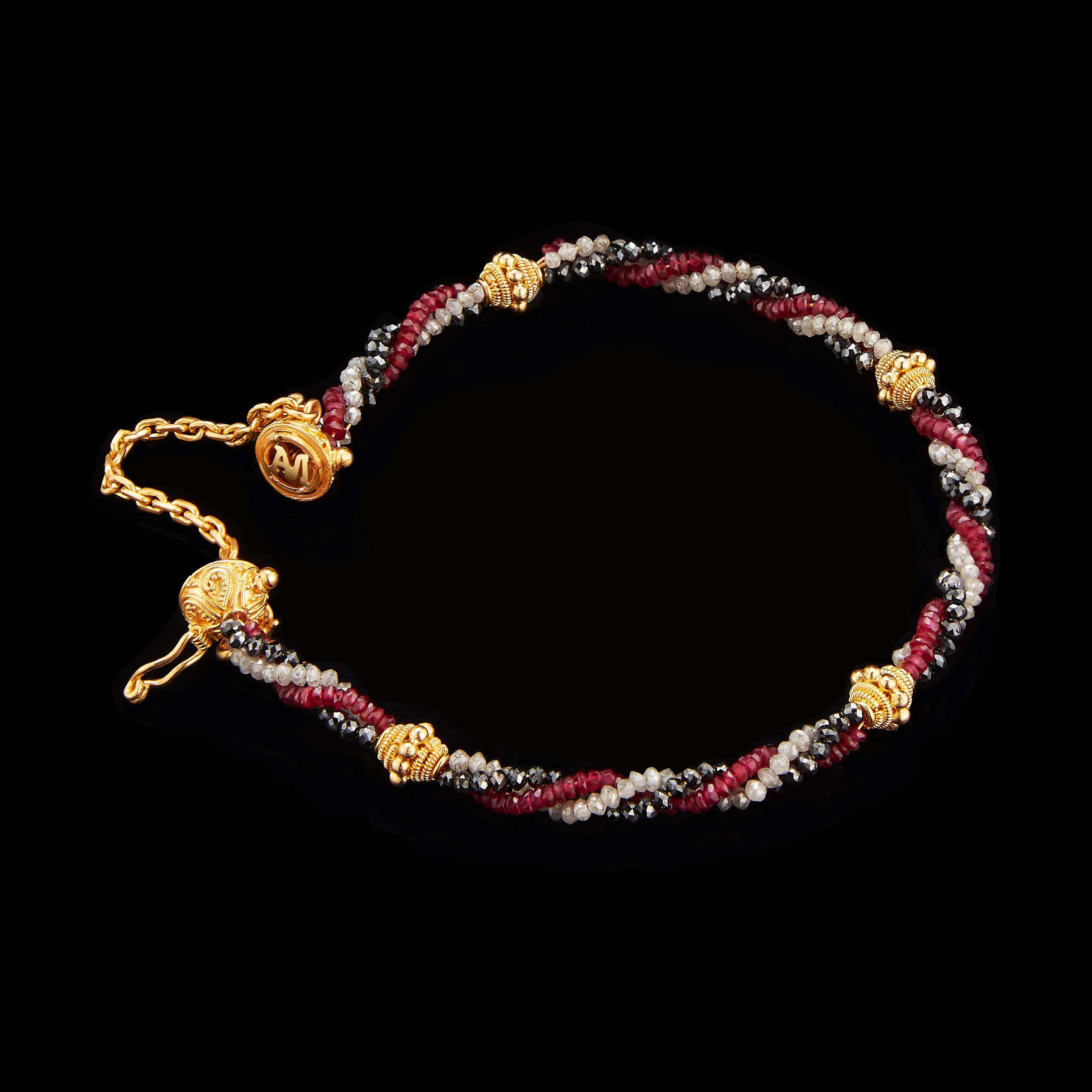 *Please contact us for more information on this piece or on creating your own Alexandra Mor custom Design. 

This bracelet features 1.31  carats of black Diamond Beads, 1.21  carats of Ruby Beads and .72 carats of white Diamond Beads, woven in