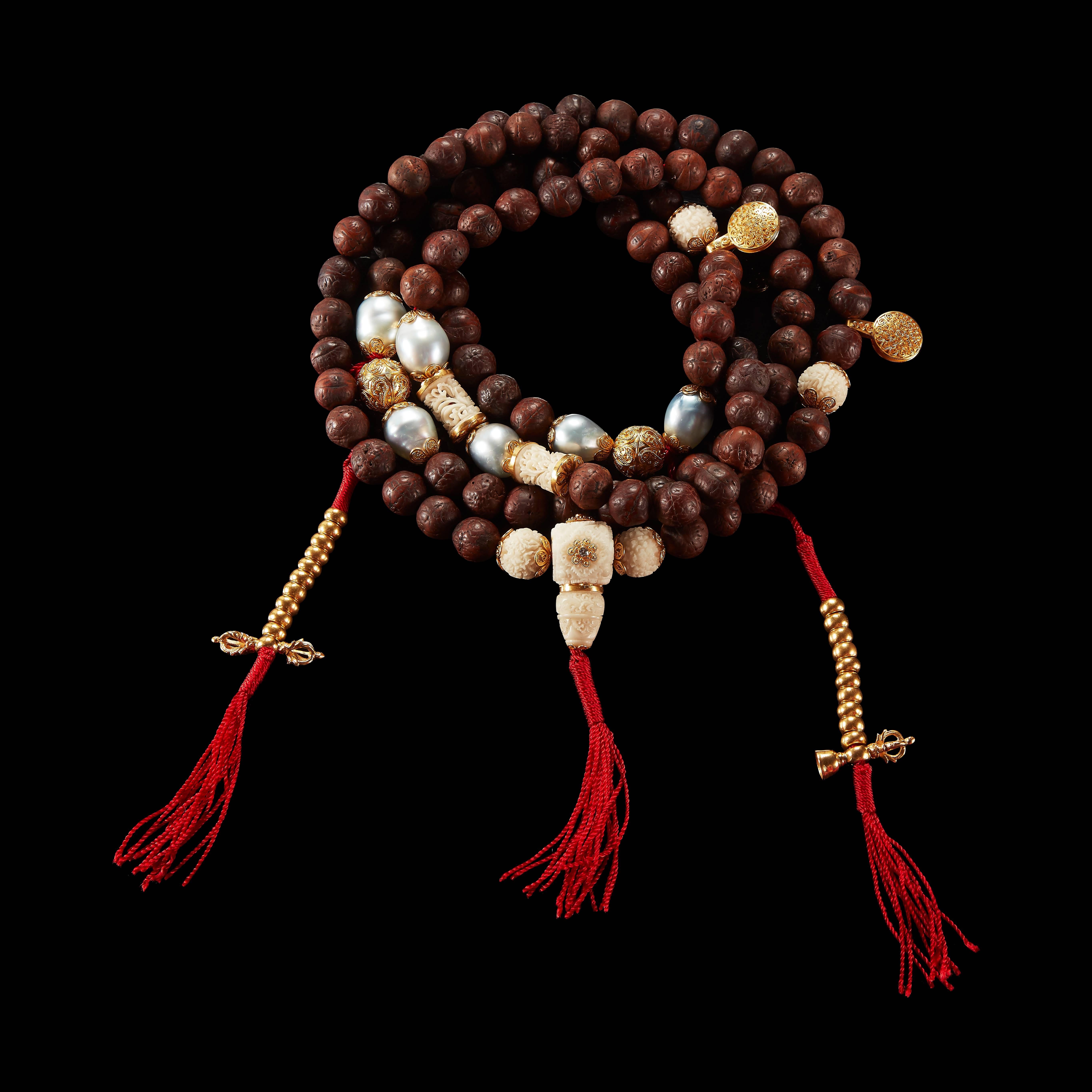 *Please contact us for more information on this piece or on creating your own Alexandra Mor custom Design.

This Alexandra Mor Tibetan-style Mala necklace features 108 Buddhist prayer beads, including ninety-four Bodhi beads, twenty yellow gold
