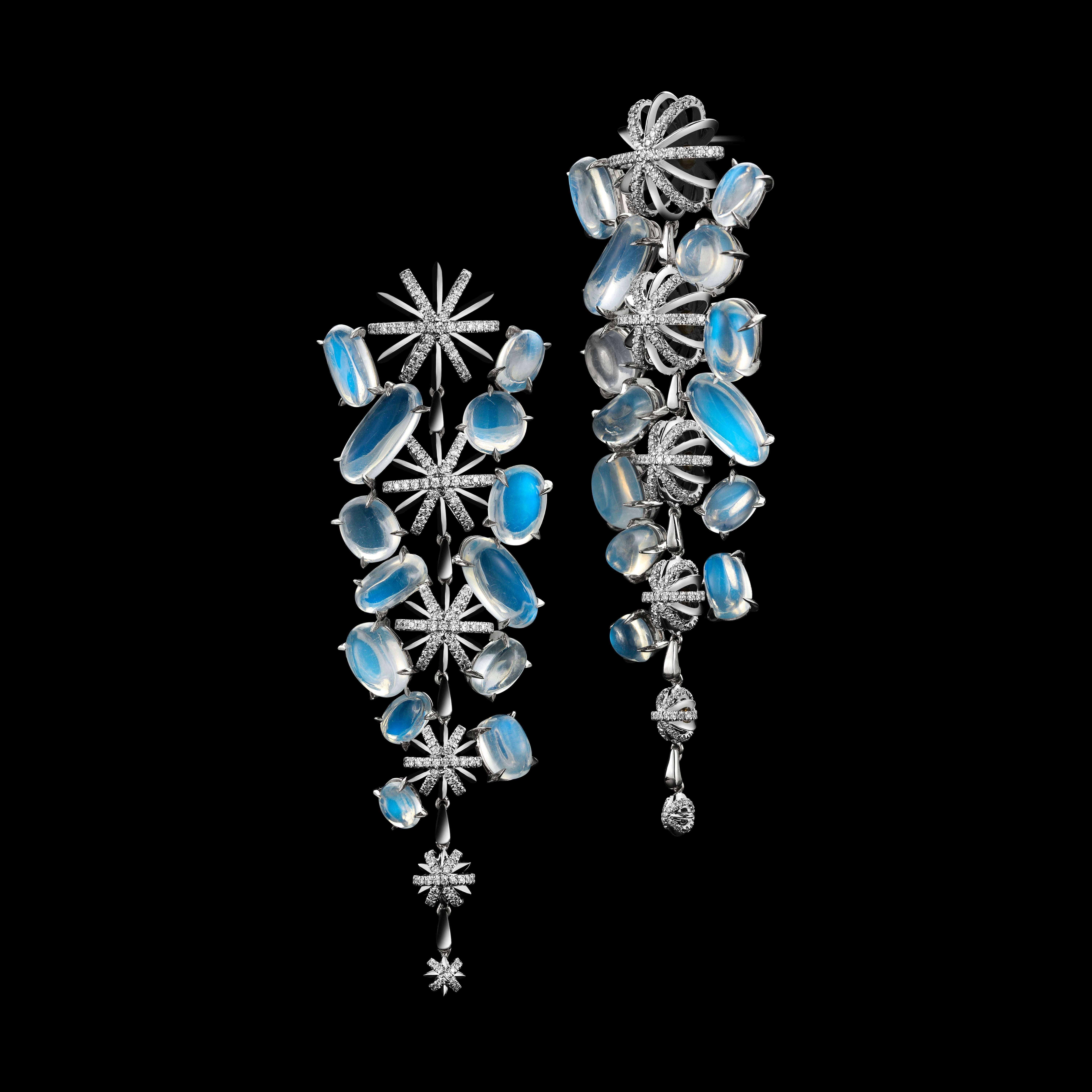 *Please contact us for more information on this piece or on creating your own Alexandra Mor custom Design.

A pair of Alexandra Mor signature Diamond Snowflake drop earrings enhanced with Moonstones. Moonstones weigh a total of 45.85 carats.
