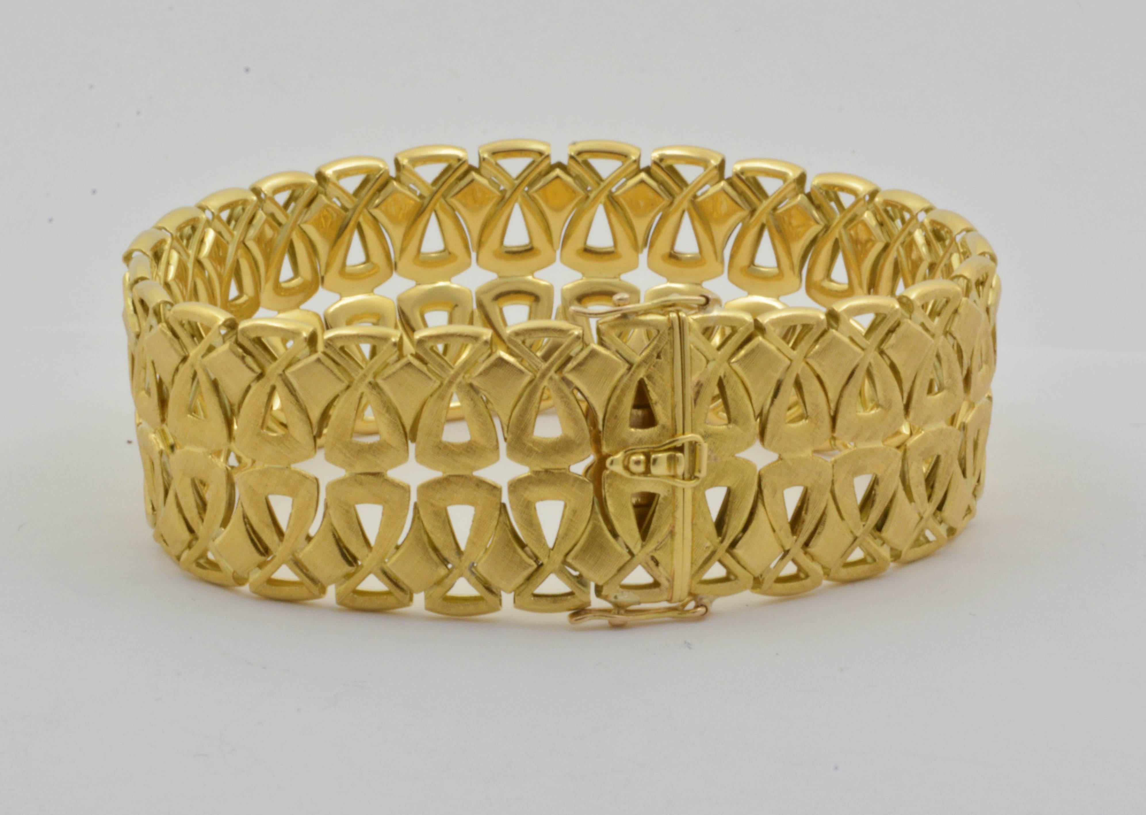 The 1980s era is exquisitely portrayed in this 18kt yellow gold bracelet. A double figure-eight pattern is separated by diamond shaped sections, giving this bracelet a unique design unlikely to be matched. Measuring at 24.3mm wide, the bracelet’s