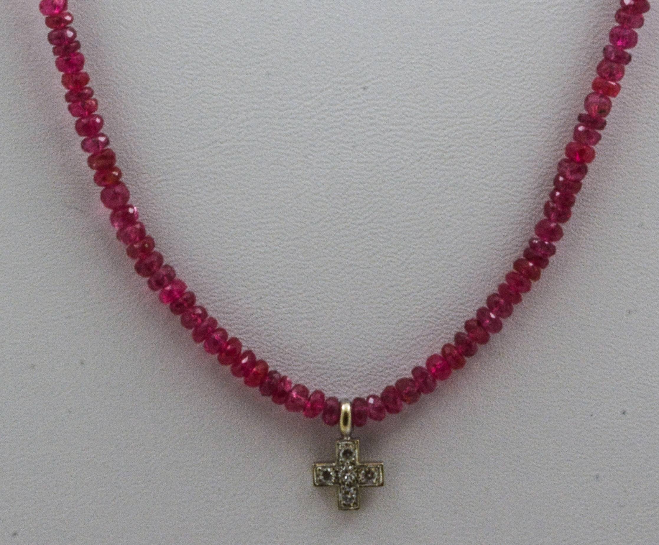 35 carats of lovely pink sapphires are strung on a 16in long strand in this beautiful diamond cross necklace. Each sapphire measures 3.45mm in diameter and is accented by the necklace’s focal point: a sparkling diamond cross set in 14kt white gold.