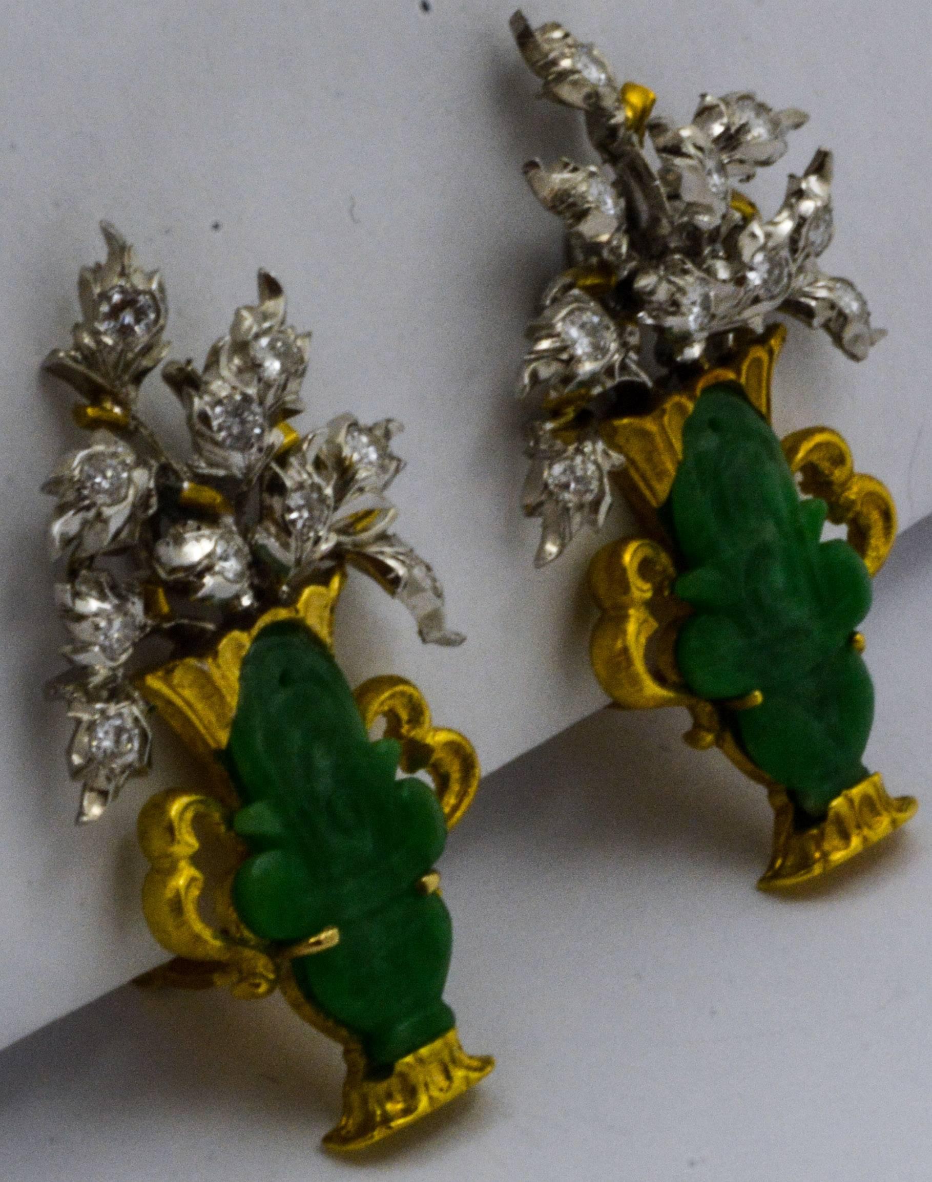 Gorgeous carved jade stones are the vibrant centerpieces of these vase-shaped earrings. A bouquet of round, brilliant-cut diamonds and white gold come together in a quintessential Buccellati style of bead and bright cut work, complementing the jade