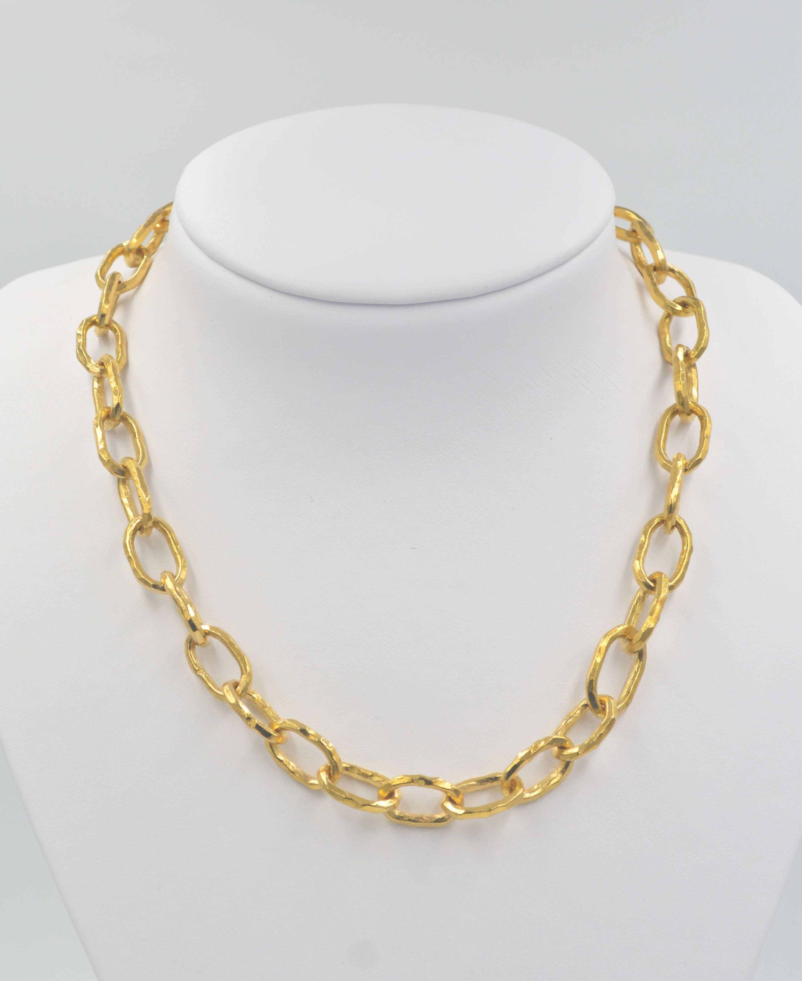 This classic Jean Mahie Large Cadene chain necklace features the primitive style hammered finish on its 22kt yellow gold links that has made Jean Mahie famous. These beautiful cadene chains are comfortable to wear and are always sure to be noticed.