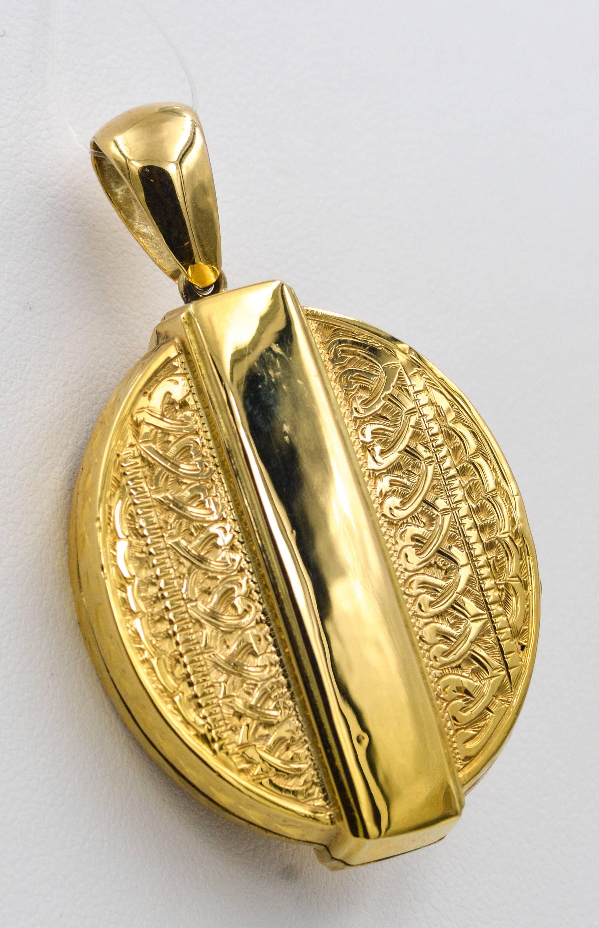 Wearing this piece of history will surely become a converstaion piece. This classic late 19th century locket is designed with a beautitul buckle and strap design with a hand engraved floral pattern covering the entire locket.  The locket has inside