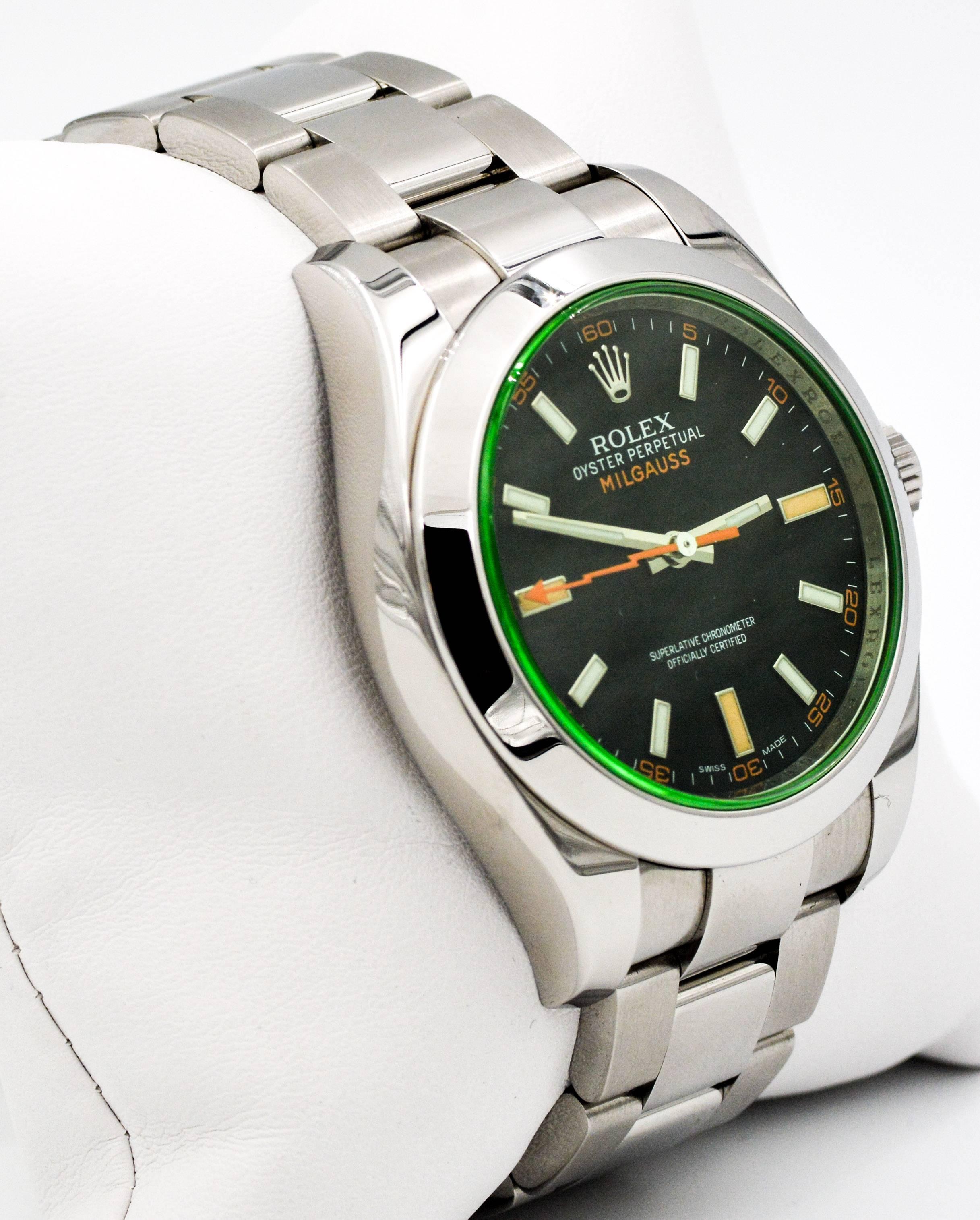 This Certified Pre-Owned stainless steel 40 mm automatic Rolex Milgauss watch is automatic and has a black  dial with white and orange dial indices, green sapphire crystal, and a stainless steel bracelet