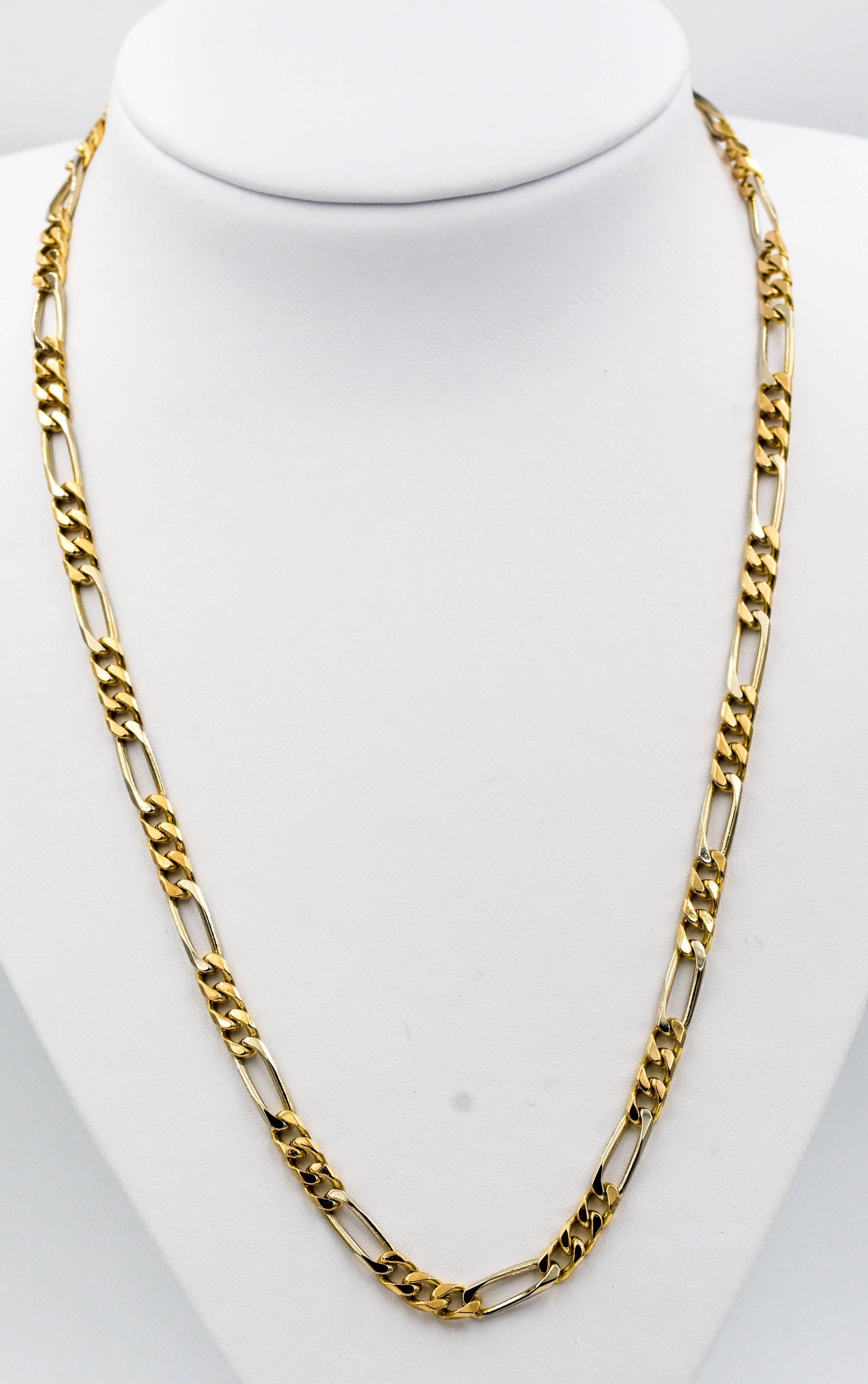 Classic 24 inch Figaro chain necklace in 18kt white and yellow gold links, with lobster claw clasp weighing an impressive 54.3 grams. This substantial Figaro chain has surpassed the Eiseman Jewels standard of quality. 