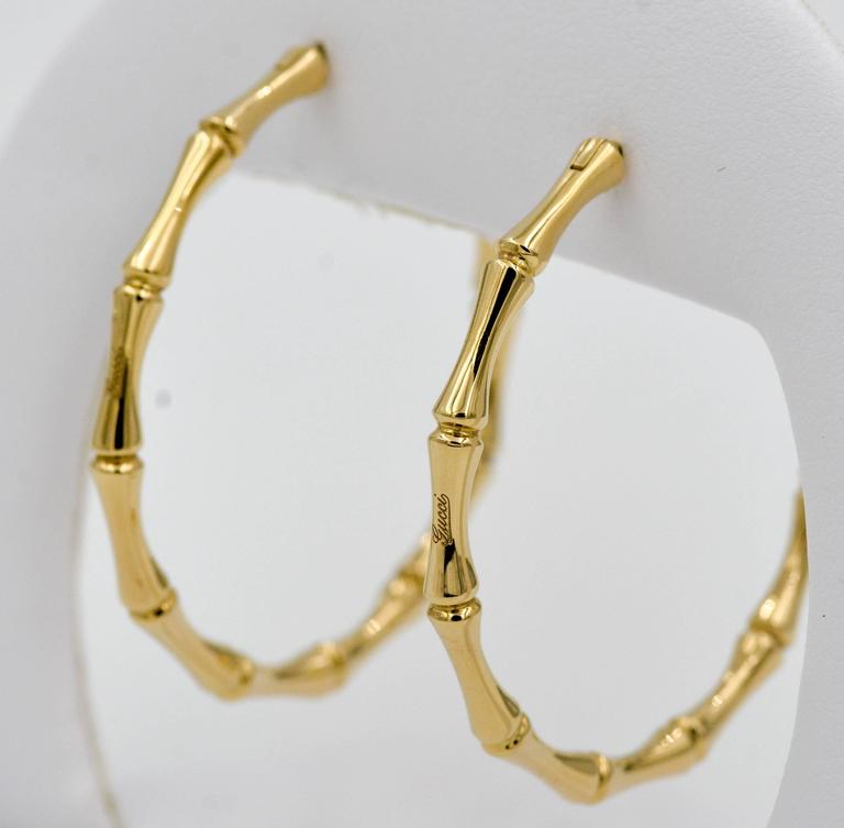 Gucci Bamboo 18 Karat Yellow Gold Hoop Earrings at 1stDibs | gucci bamboo  hoop earrings, gucci bamboo earrings gold, gucci gold bamboo hoop earrings