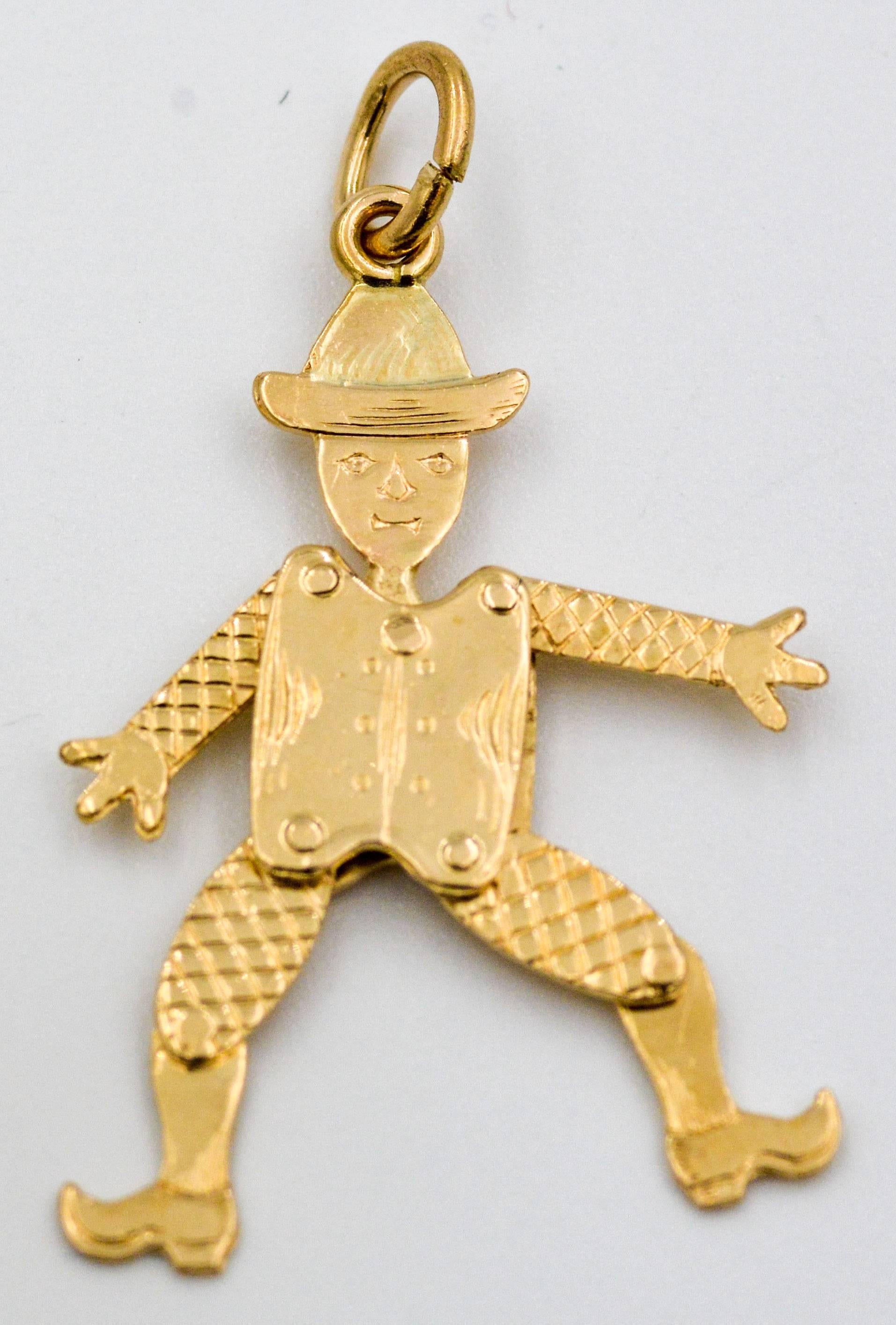 With vintage style, expert craftsmanship and whimsical character, this delightful 14kt yellow gold charm is designed in the likeness of a Dutchman with a classic Dutch costume.  This captivating charm is executed with articulated arms, legs, and and