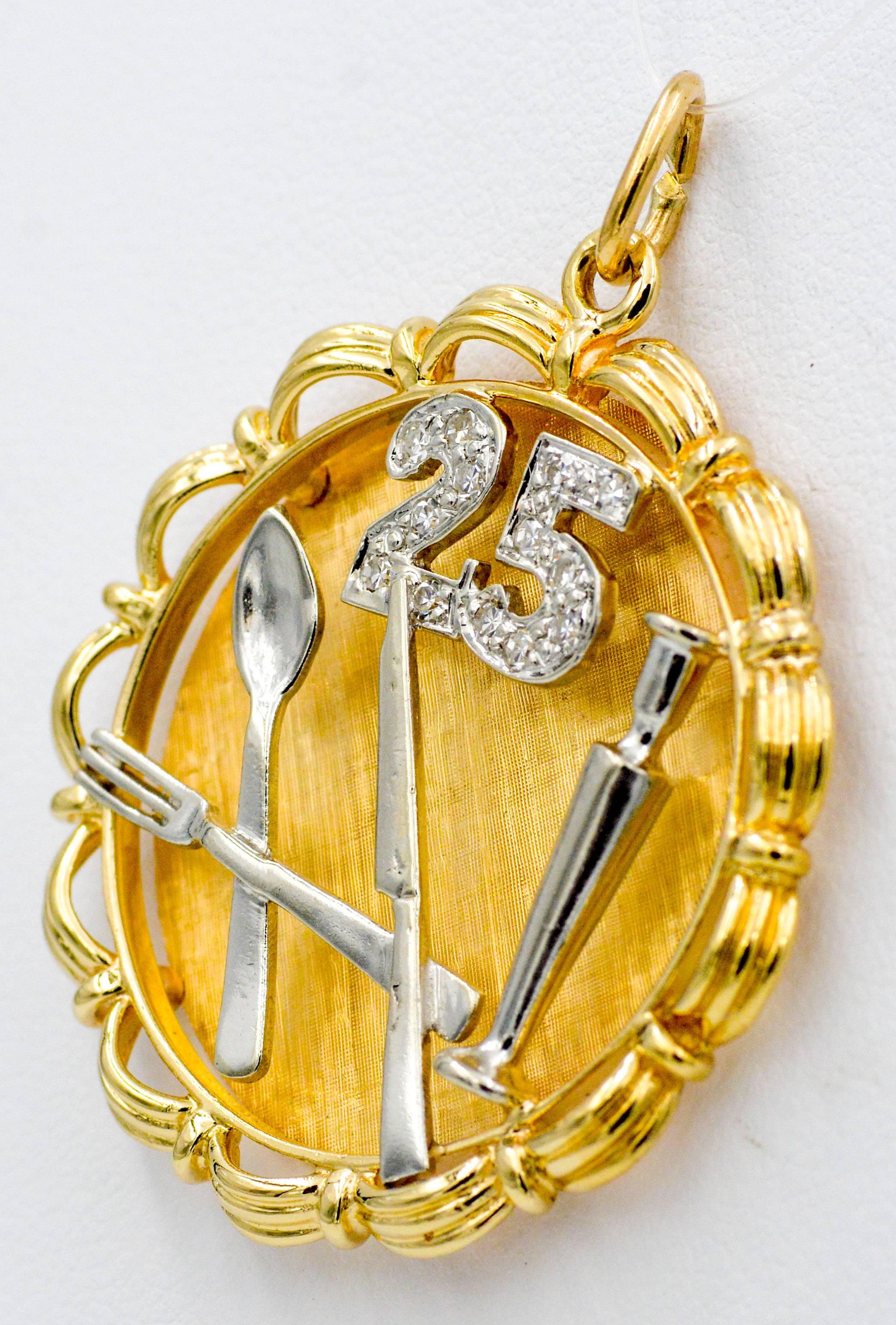 This Charm is ideal for a 25th anniversary gift! Set in 14K yellow and white gold, with the number 25 with round brilliant cut pave diamonds (0.15ctw with G-H color and VS clarity).  The charm also has a spoon, knife, fork, and candle stick all made