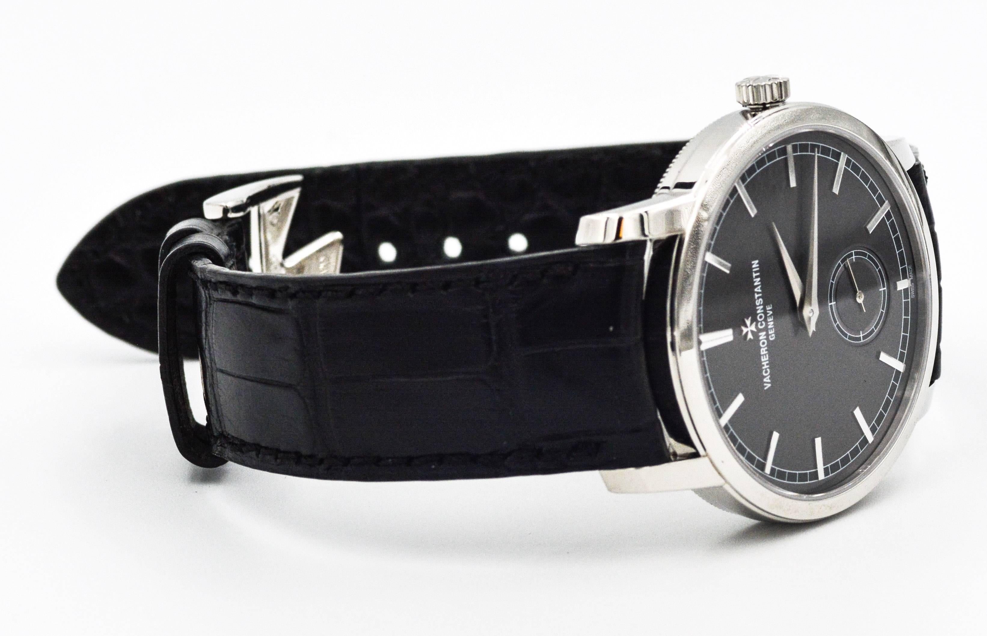 A masculine Vacheron Constantin Traditionnelle watch in platinum, 38mm with a manual-winding movement. and outfitted with a handsome black leather band.
