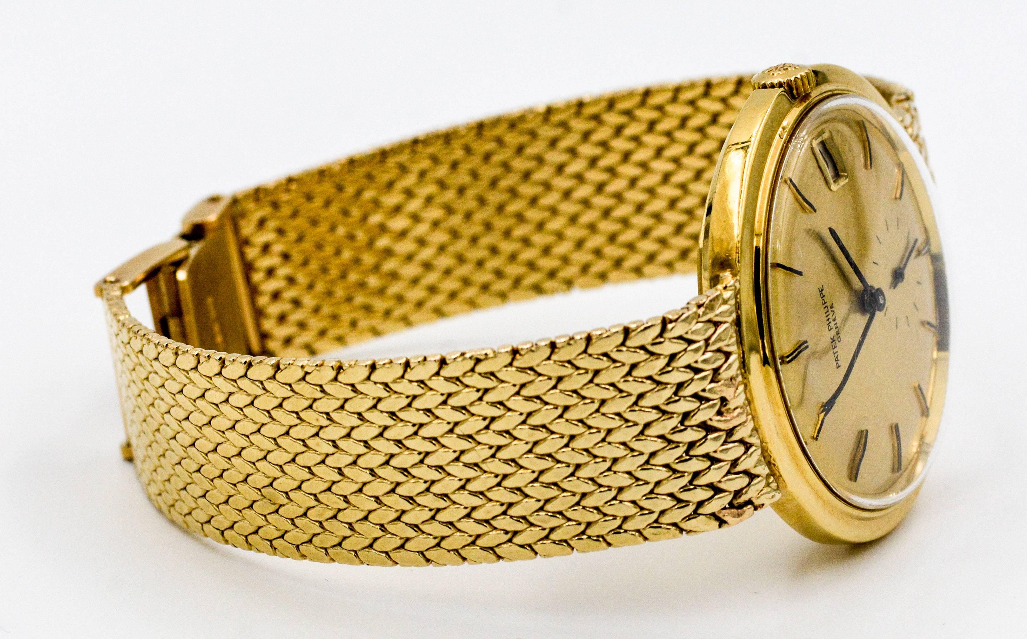 Gents 1966 14kt Yellow Gold Patek Philippe wrist watch containing a mesh type style bracelet in a 36mm case, automatic movement. Reference number 3541