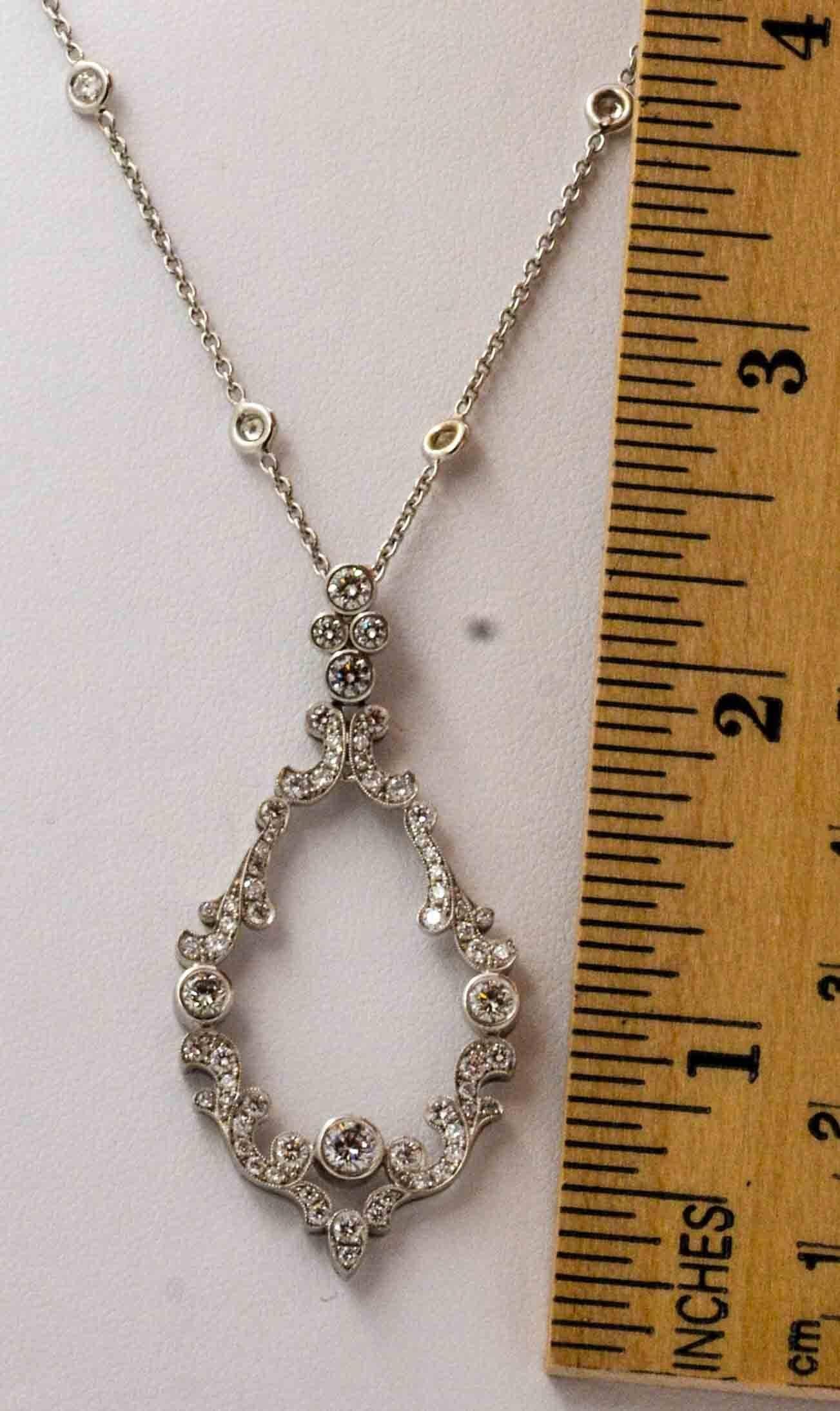 Round Cut 3.06 Carats Diamonds, Platinum Scroll Pendant