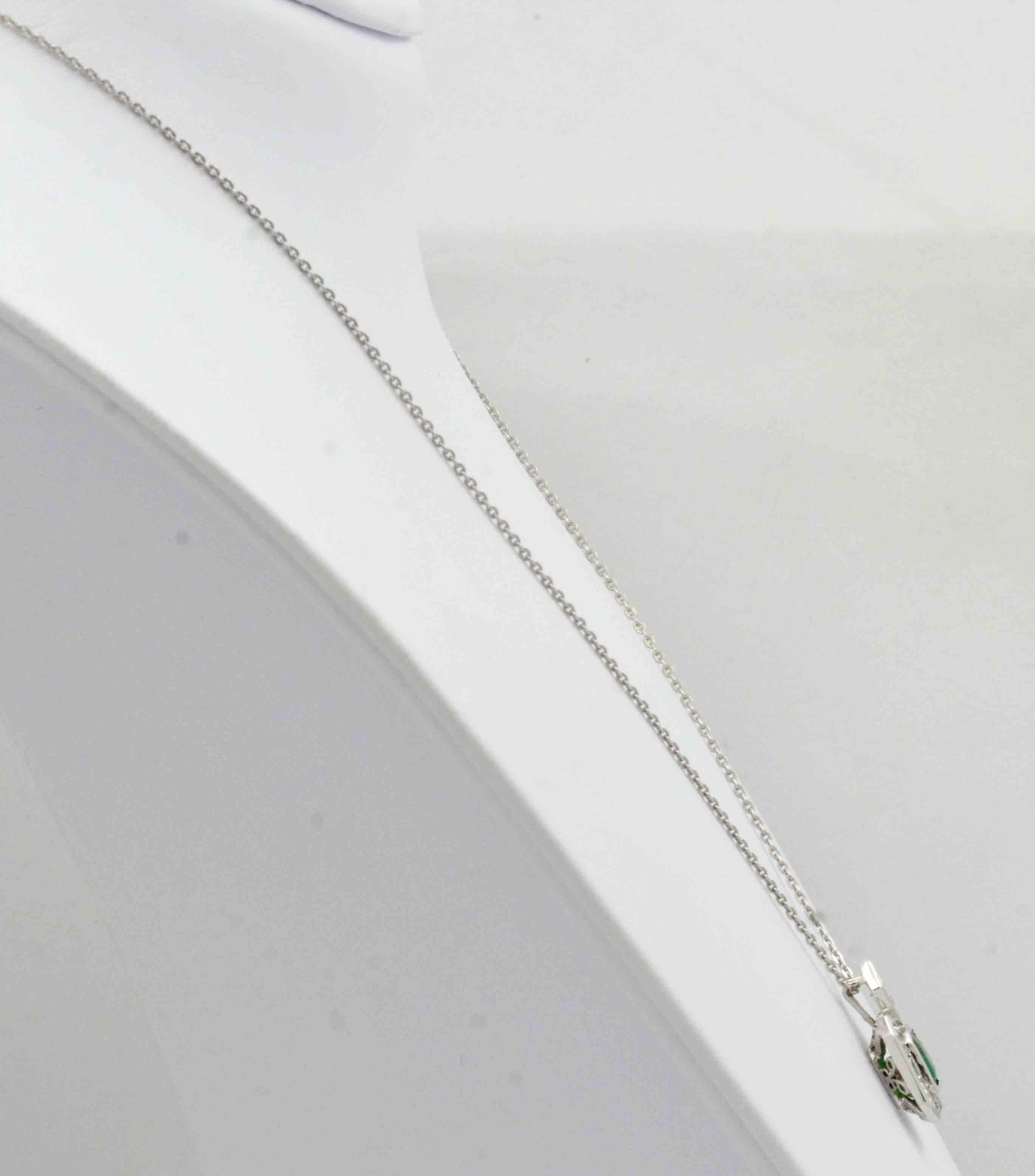 Women's Emerald Diamond Platinum Pendant