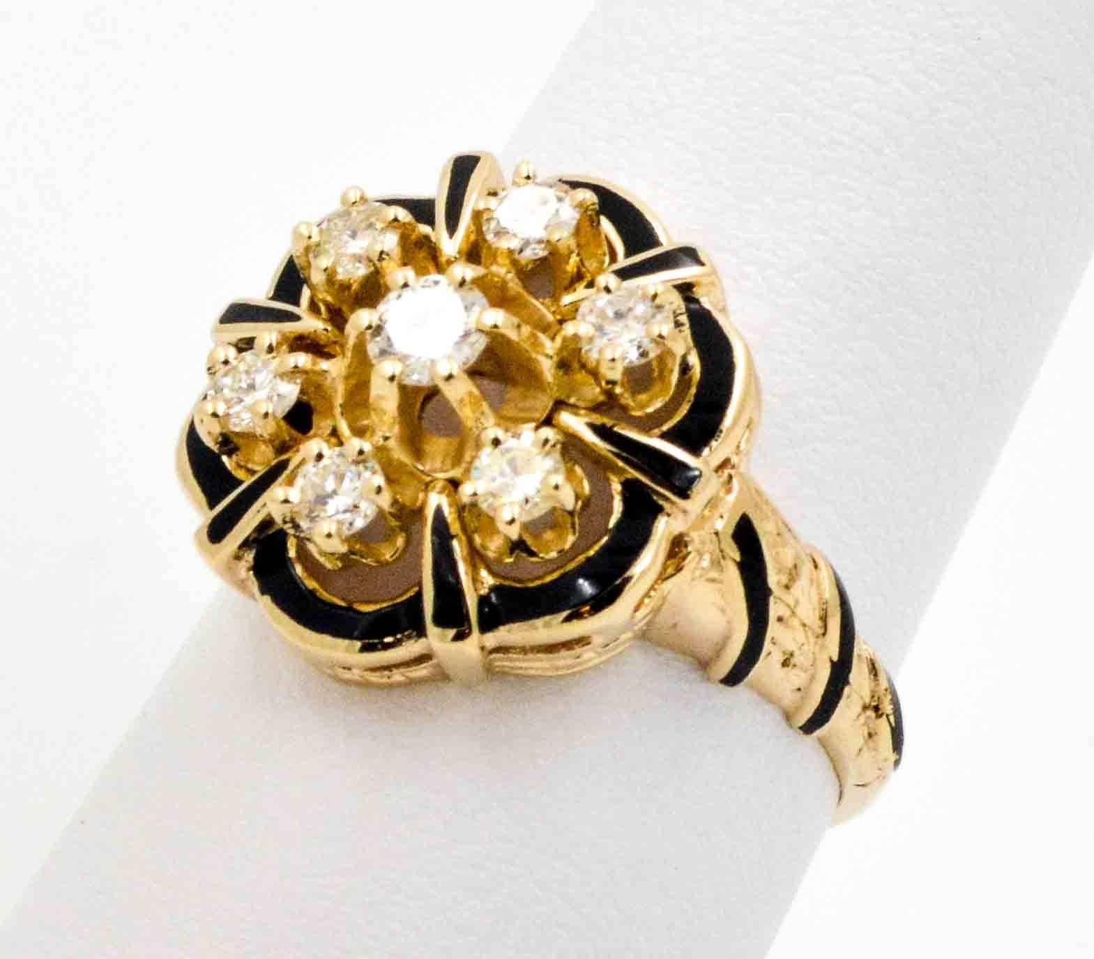 Getting dressed for the evening is even more enjoyable with this dazzling 14kt yellow gold ring featuring seven round brilliant cut diamonds set in a flower design. The seven round brilliant cut diamonds have an approximate combined weight of 0.40