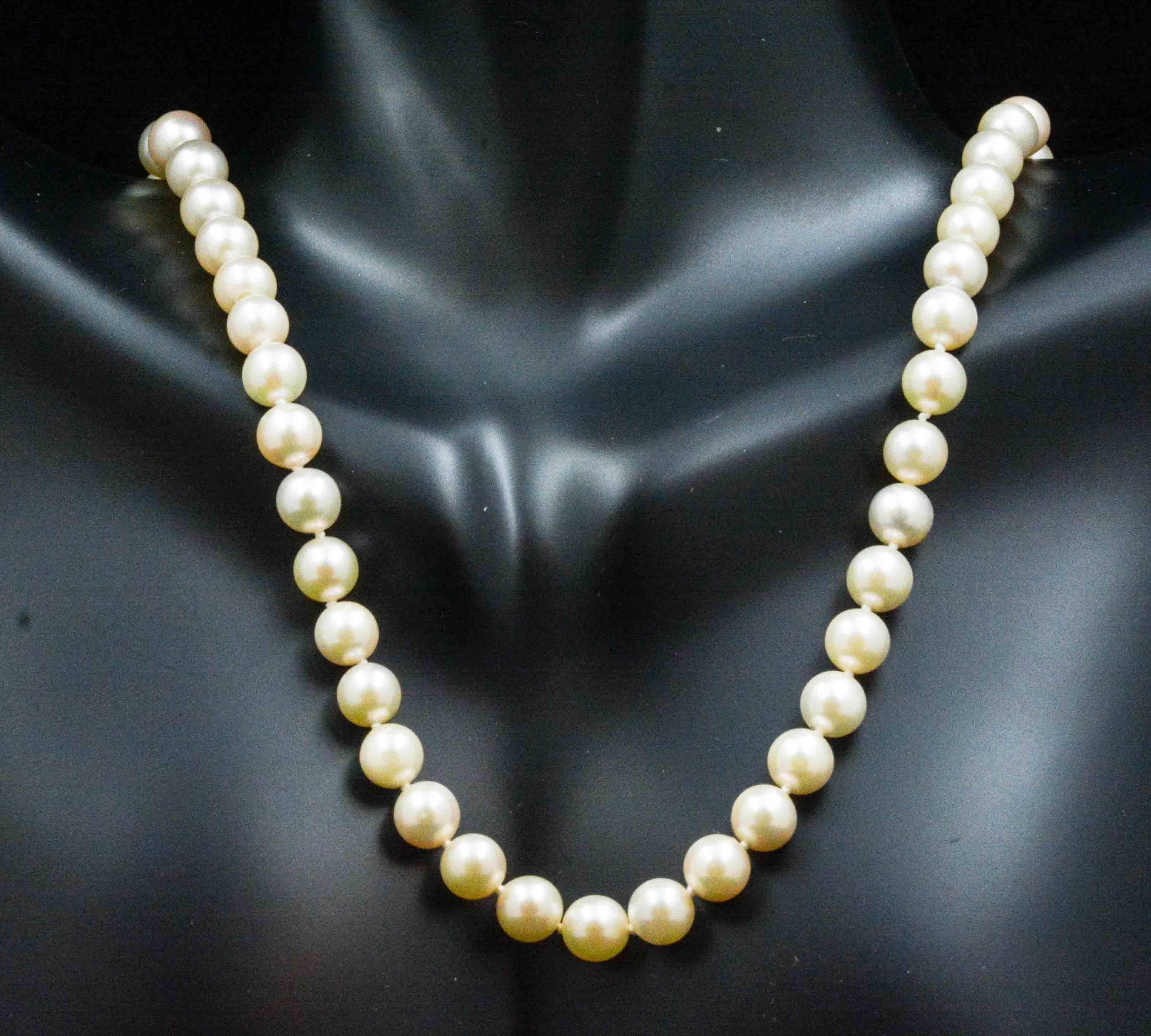 Completing the elegant well dressed look, this 18 inch necklace of 69 lovely cream colored cultured pearls will do it. This strand of 6 mm pearls are masterfully strung with an 18 kt  yellow gold filigree clasp.