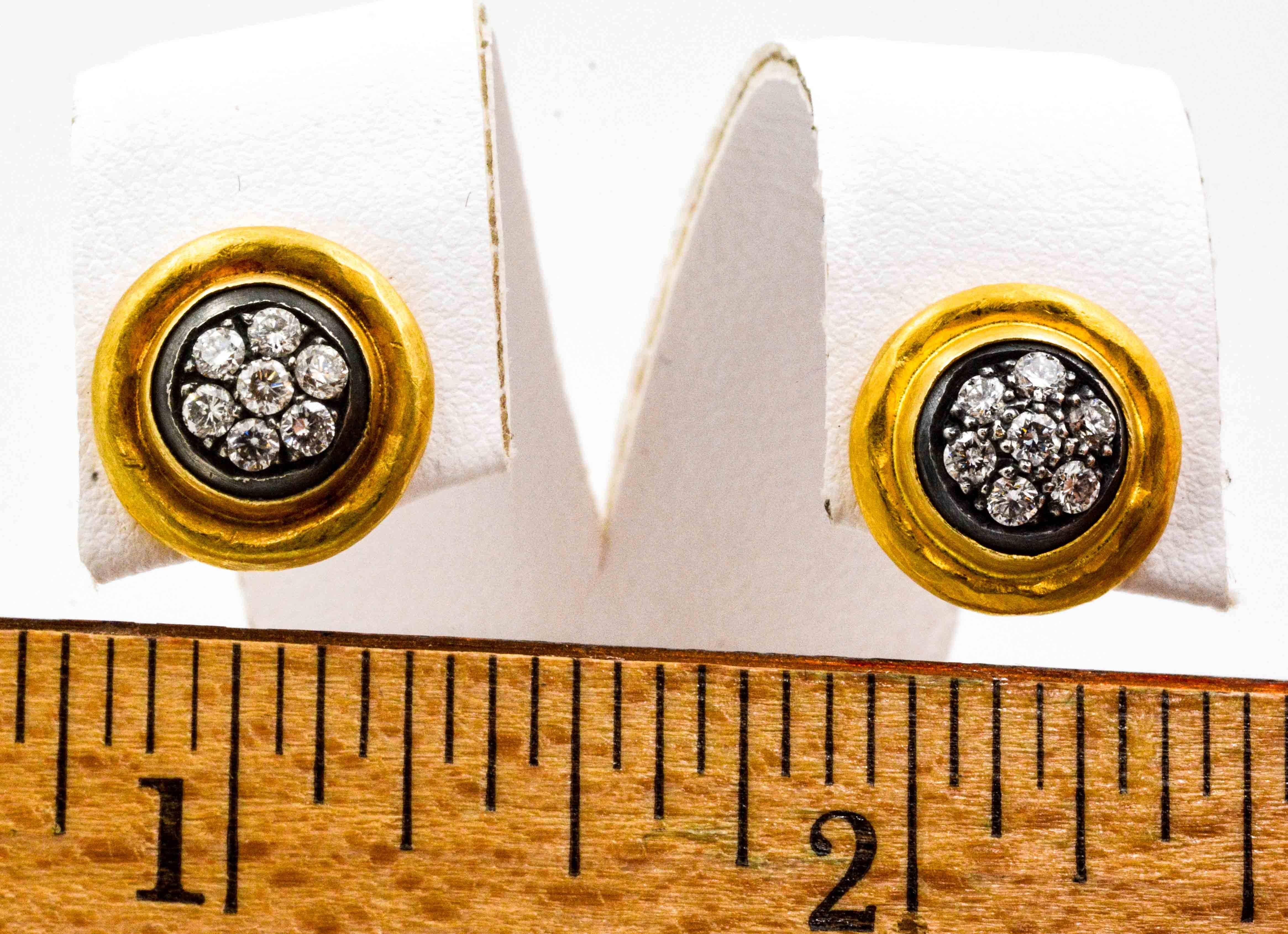 Created in the Etruscan design with vitality and vivid coloring, these 24 kt yellow gold with oxidized sterling silver stud earrings are simply irresistible.  The 24 kt gold appears brighter than the sun matched against the oxidized silver. Fourteen