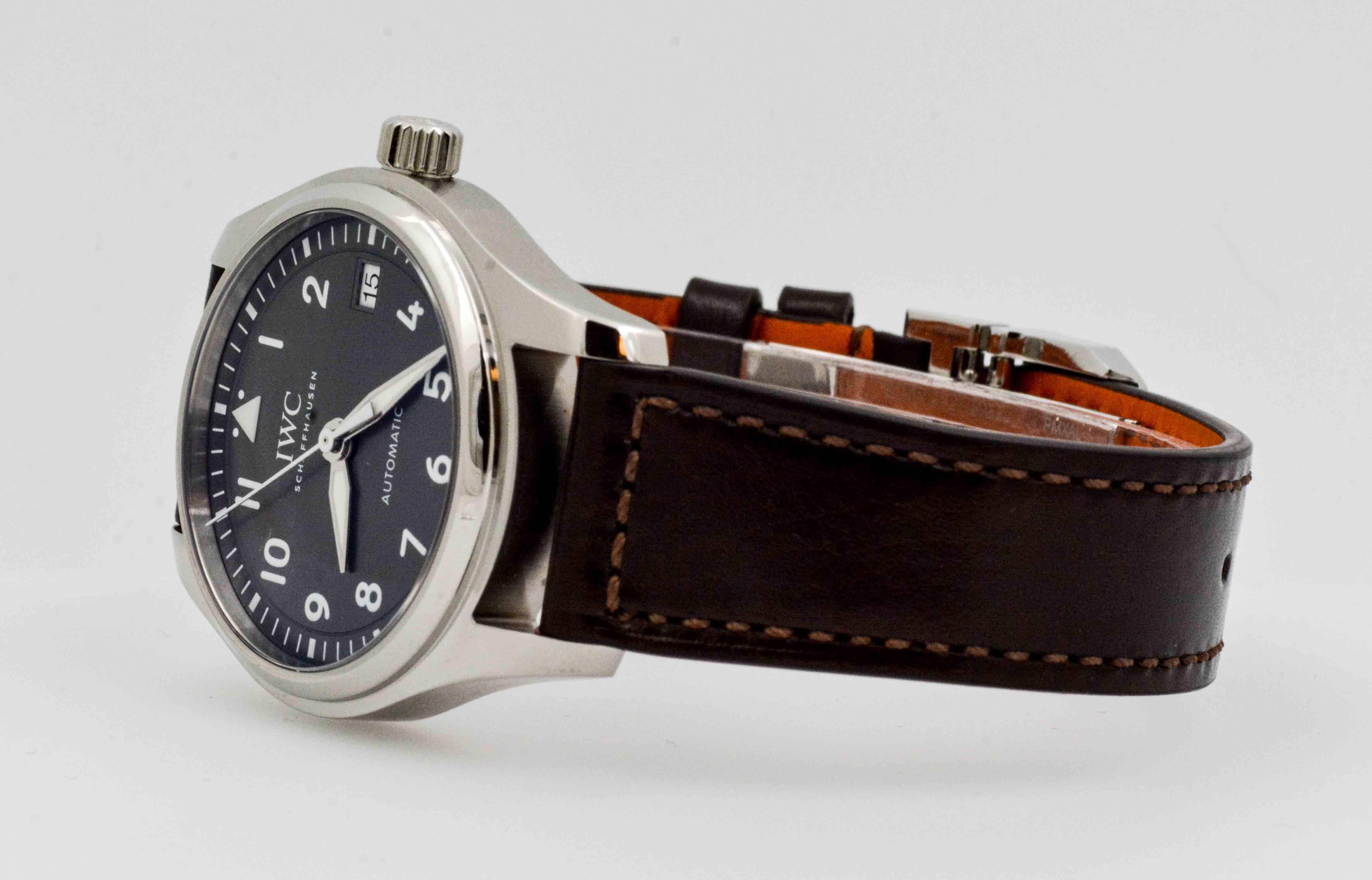 Classic style wrist watch with a striking slate gray Arabic dial face is exactly the time piece you will need to get you through your busy work day. This International Watch Company Pilot watch is 36 mm, has date, second hand and a classy brown