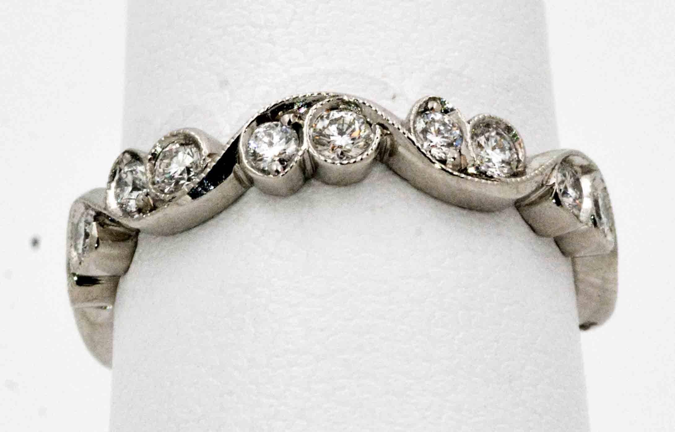 Round Cut 0.65 Carat Diamond Platinum Swirling Eternity Band 