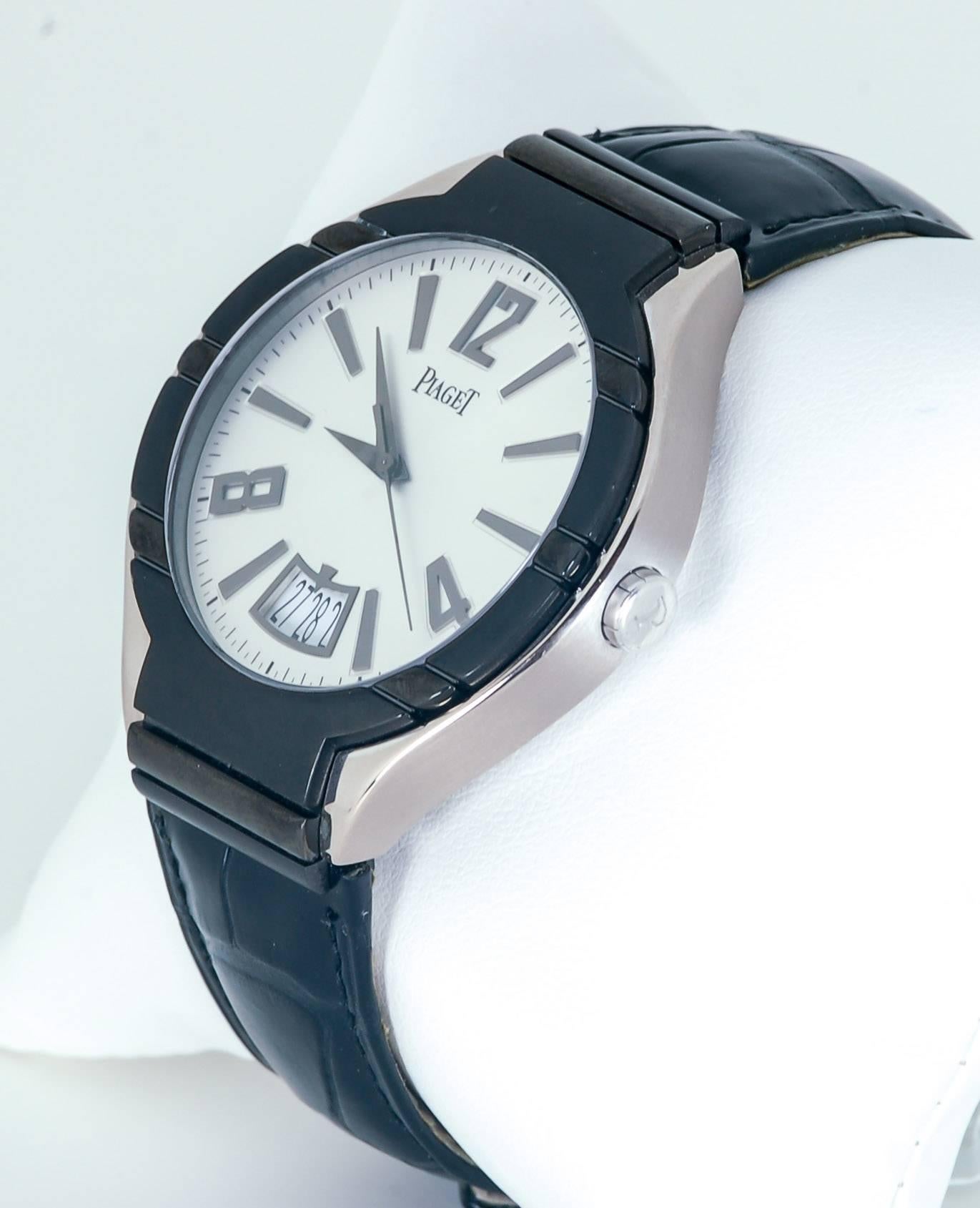 A handsome 18kt white gold gents Piaget Polo large timepiece.  The watch is a 43mm silvered dial with black Arabic dial markers and black leather band.  Reference number G0A3140