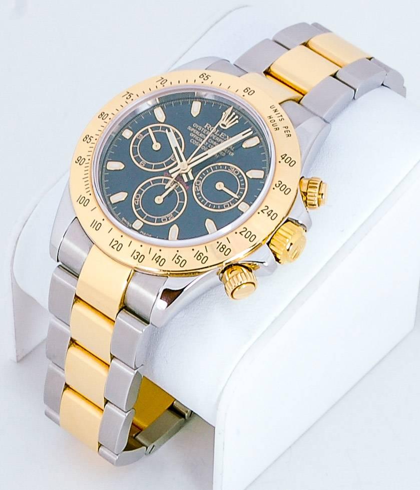 18kt yellow gold and stainless steel play against each other beautifully in this certified pre-owned Rolex. This timepiece features a beautiful 40mm black dial and a two-tone Oyster bracelet. Reference #116525.